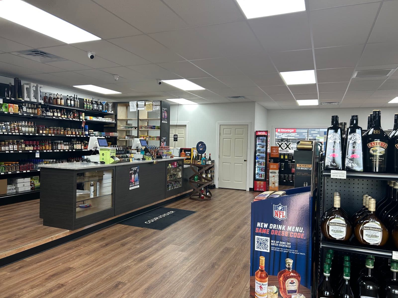 Liquor Legends checkout counter and front of store